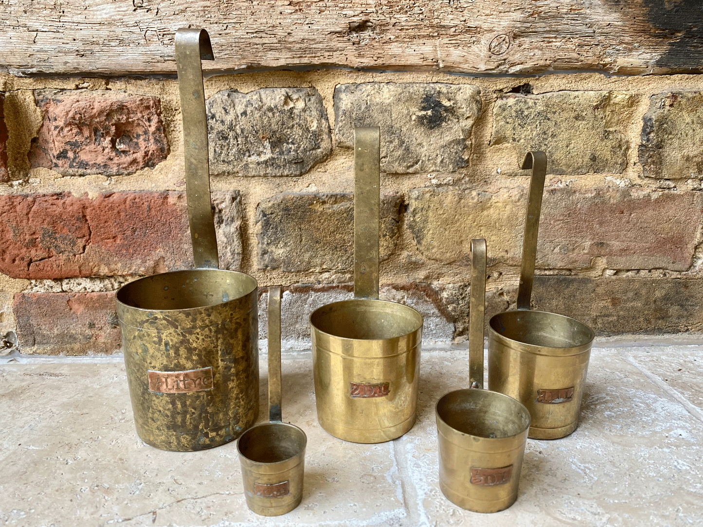 vintage french set graduated brass measures measuring cup